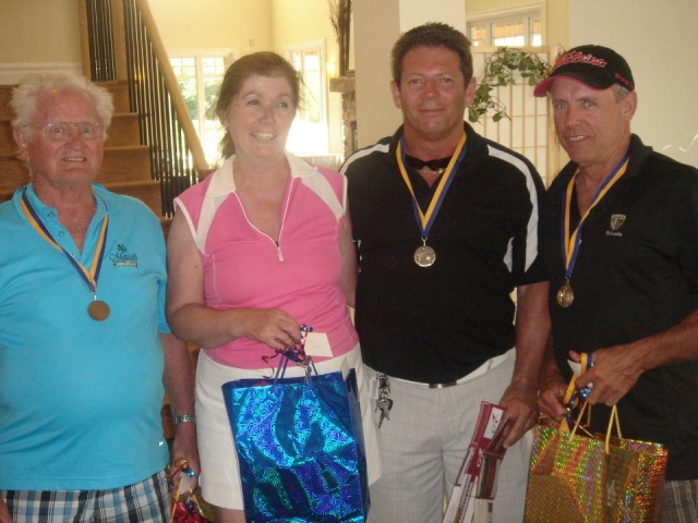 Mary Smith, prize coordinator, with the Lowest Score Team - Frank Kline, Joey Schock & Doug Corrigan (ringer Crae missing)